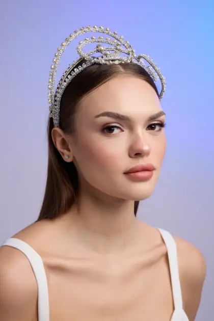 Melody Taç